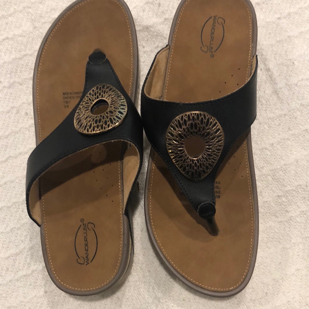 Comfy walking sandals. Never worn.